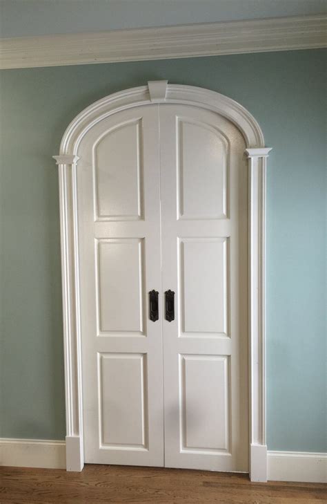 bespoke arched internal doors.